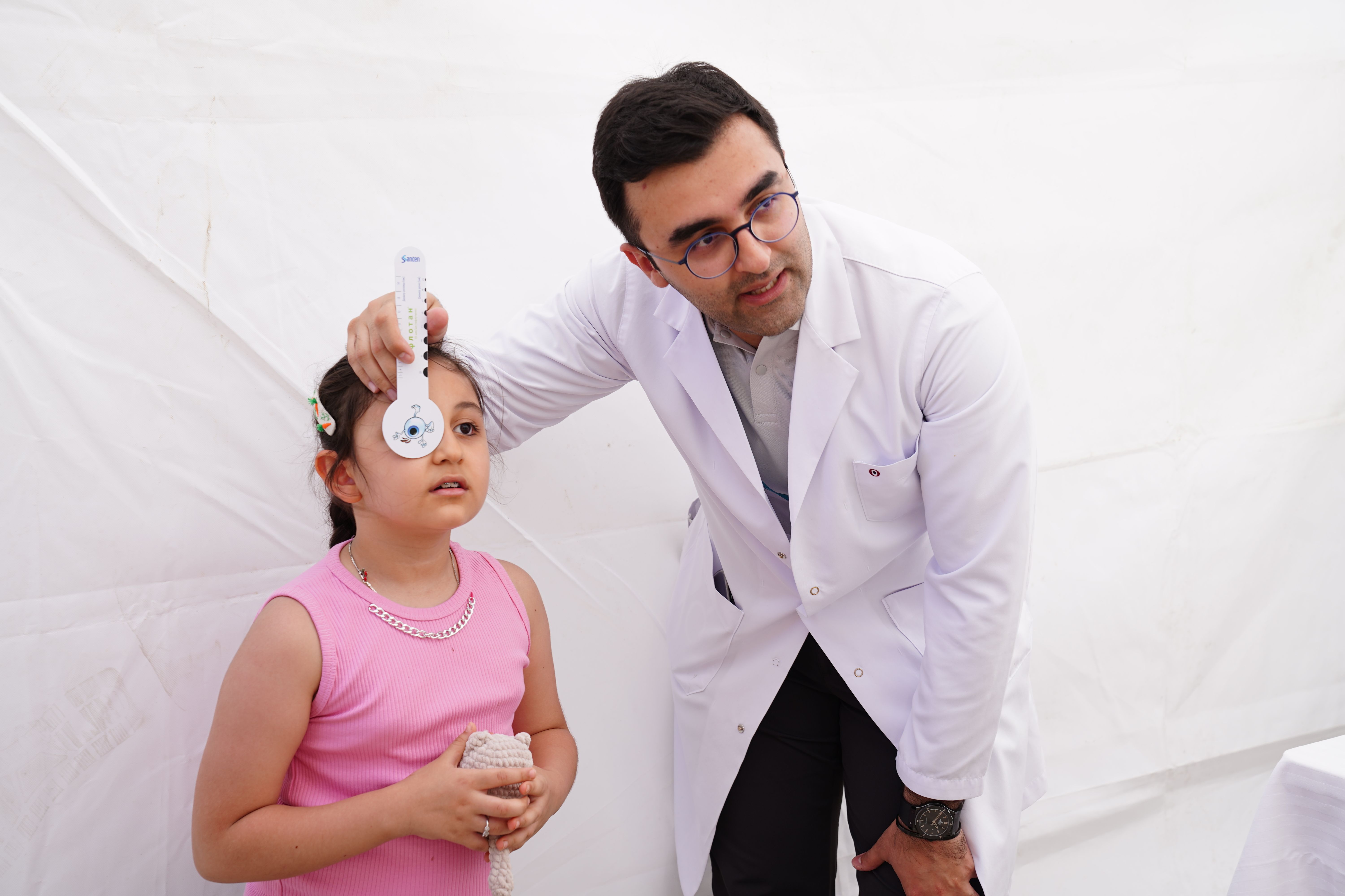 Professional eye examination being performed by optometrist